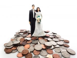 bigstock-Coin-Couple-63606091